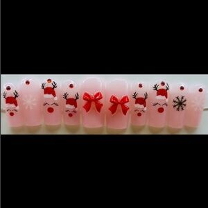 Festive Pink and Red Christmas nails.